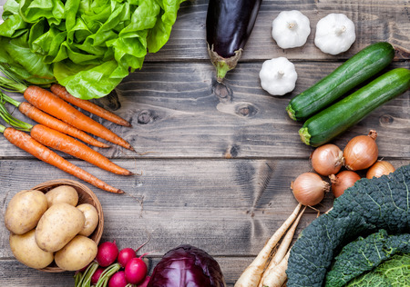 Fresh and organic bio vegetables on a wooden backgroundの写真素材