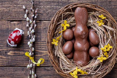 Traditional Easter eggs on a wooden background
