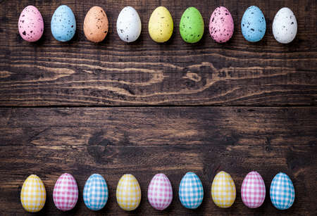 Traditional Easter eggs on a wooden backgroundの写真素材