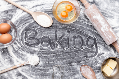 Baking and cooking concept, variety of ingredients and utensils with copyspaceの写真素材