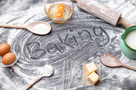 Baking and cooking concept, variety of ingredients and utensils with copyspaceの写真素材