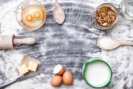 Baking and cooking concept, variety of ingredients and utensils with copyspaceの写真素材