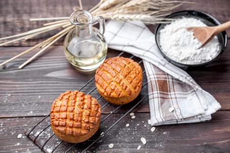 Delicious and fresh pastry on dark wooden backgroundの写真素材