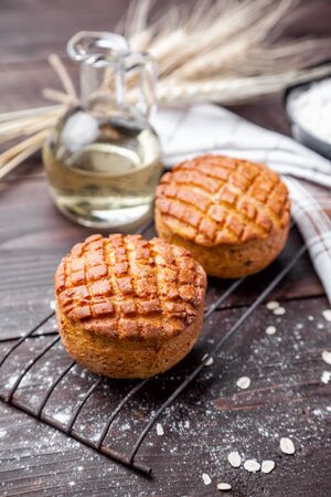 Delicious and fresh pastry on dark wooden backgroundの写真素材