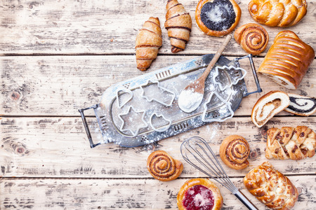 Delicious Christmas holiday baking background with ingredients and utensilsの写真素材