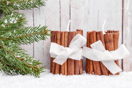 Traditional Christmas decoration background with fir and snowの写真素材