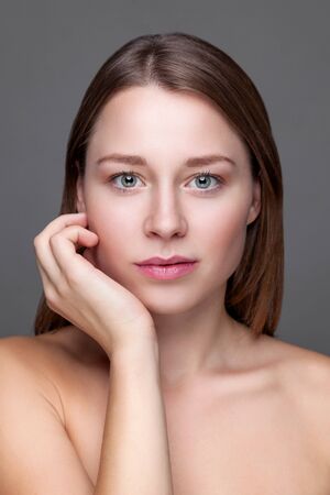 Young naturally beautiful woman with great skin complexionの写真素材