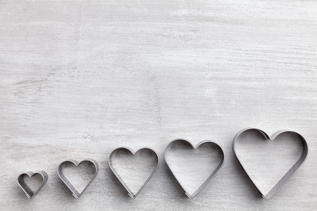 Love concept. Hearts on grey rustic backgroundの写真素材