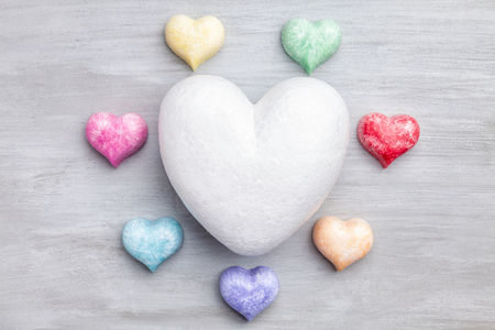 Love concept. Colorful hearts on grey rustic backgroundの写真素材