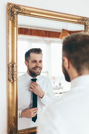 Handsome man getting ready for the big occasion.の写真素材