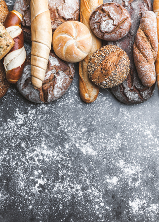 Variety of delicious freshly baked and healthy breadの写真素材