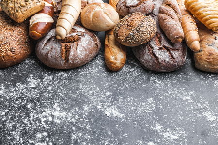 Delicious freshly baked bread on rustic backgroundの写真素材