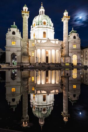 Karlskirche church in Vienna, Austria at nightの写真素材