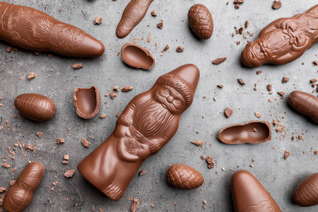 Delicious festive Christmas chocolate and sweets on rustic backgroundの写真素材
