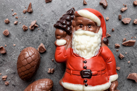 Delicious festive Christmas chocolate and sweets on rustic backgroundの写真素材