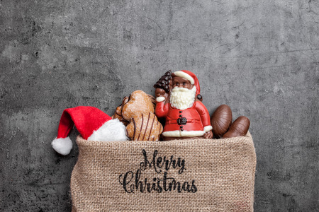 Festive Christmas rustic background with sweets and decorationの写真素材