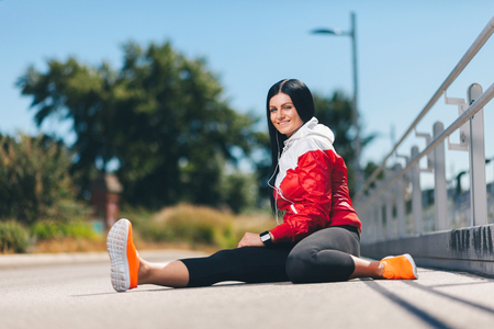 City workout. Beautiful young woman training in an urban settingの写真素材