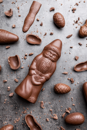 Delicious festive Christmas chocolate and sweets on rustic backgroundの写真素材