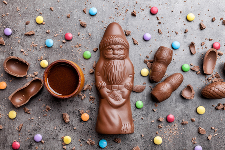 Delicious festive Christmas chocolate and sweets on rustic backgroundの写真素材