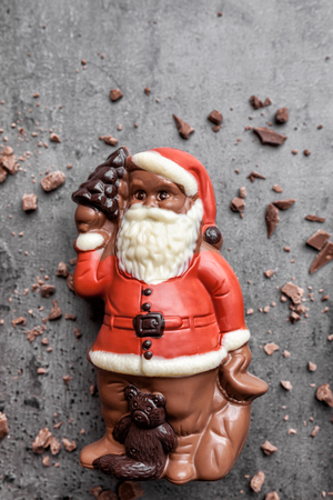 Delicious festive Christmas chocolate and sweets on rustic backgroundの写真素材