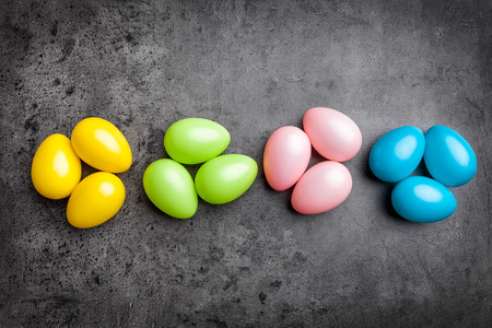 Traditional Easter eggs on a rustic backgroundの写真素材