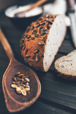 Delicious freshly baked bread on wooden backgroundの写真素材