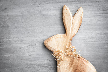 Traditional Easter holiday bunny on a rustic backgroundの写真素材