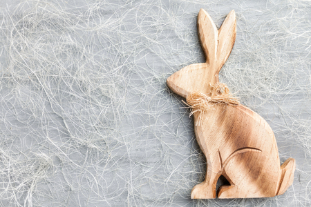 Traditional Easter holiday bunny on a rustic backgroundの写真素材