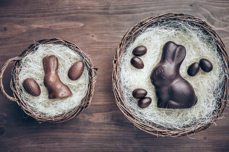 Delicious chocolate Easter bunny inside a basketの写真素材