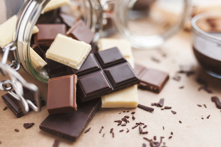 Variety of delicious chocolate bars in a jarの写真素材