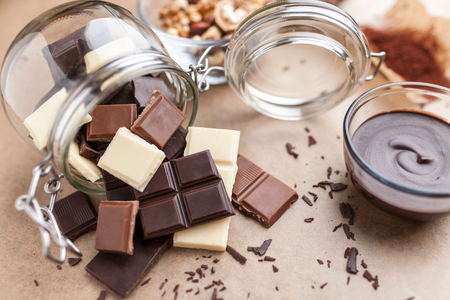 Variety of delicious chocolate bars in a jarの写真素材