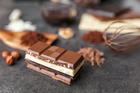 Delicious and sweet variety of chocole on rustic backgroundの写真素材