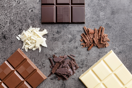 Delicious and sweet variety of chocole on rustic backgroundの写真素材