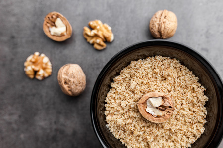 Delicious walnuts on grey rustic backgroundの写真素材