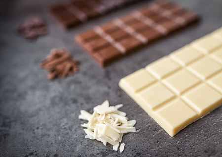 Delicious and sweet variety of chocole on rustic backgroundの写真素材