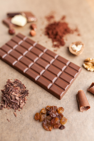 Delicious sweet chocolate bar and ingredientsの写真素材