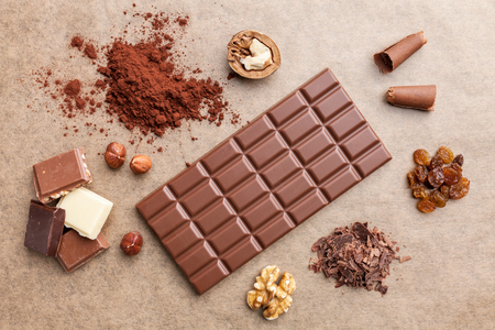 Delicious sweet chocolate bar and ingredientsの写真素材