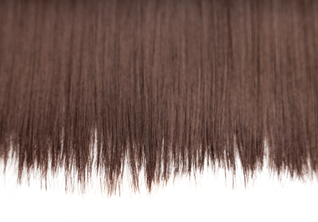 Closeup on luxurious straight glossy brown hairの写真素材