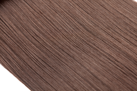 Closeup on luxurious straight glossy brown hairの写真素材