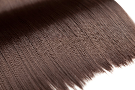 Closeup on luxurious straight glossy brown hairの写真素材
