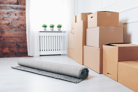 Moving concept. Room full of cardboard boxesの写真素材
