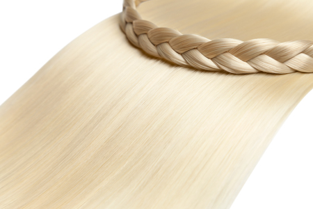 Closeup on luxurious straight glossy blonde hairの写真素材