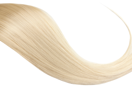 Closeup on luxurious straight glossy blonde hairの写真素材