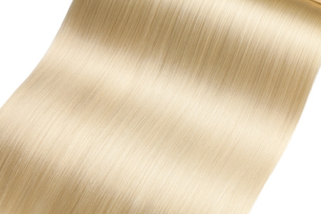 Closeup on luxurious straight glossy blonde hairの写真素材