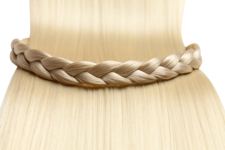 Closeup on luxurious straight glossy blonde hairの写真素材