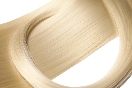 Closeup on luxurious straight glossy blonde hairの写真素材