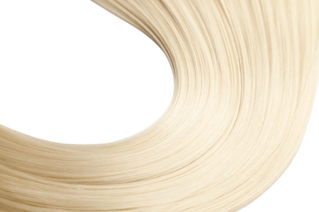 Closeup on luxurious straight glossy blonde hairの写真素材
