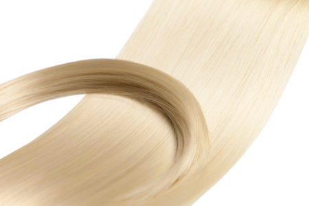 Closeup on luxurious straight glossy blonde hairの写真素材