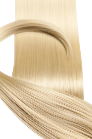 Closeup on luxurious straight glossy blonde hairの写真素材