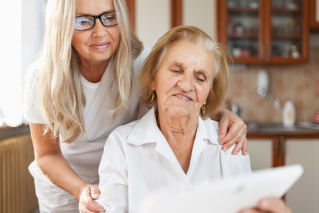 Providing care and support for elderlyの写真素材